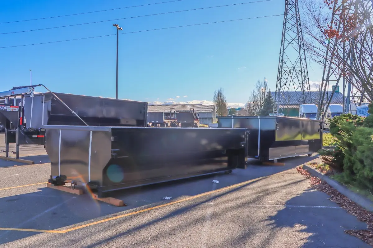 Roll-off dumpster ready for waste disposal at job site for Construction Dumpster Rental in Bryant